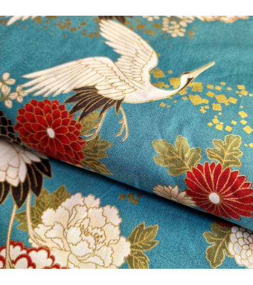 Japanese fabric. Flying Cranes and flowers in greenish blue.