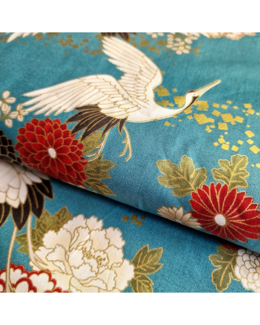 Japanese fabric. Flying Cranes and flowers in greenish blue.