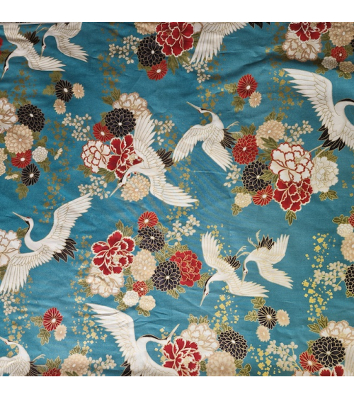Japanese fabric. Flying Cranes and flowers in greenish blue.
