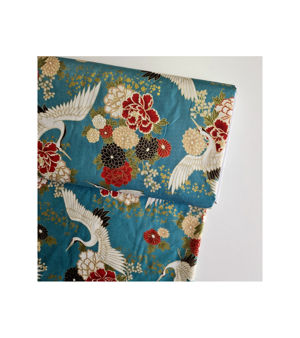 Japanese fabric. Flying Cranes and flowers in greenish blue.