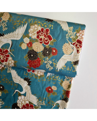 Japanese fabric. Flying Cranes and flowers in greenish blue.