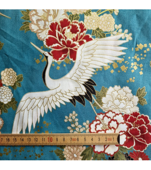 Japanese fabric. Flying Cranes and flowers in greenish blue.