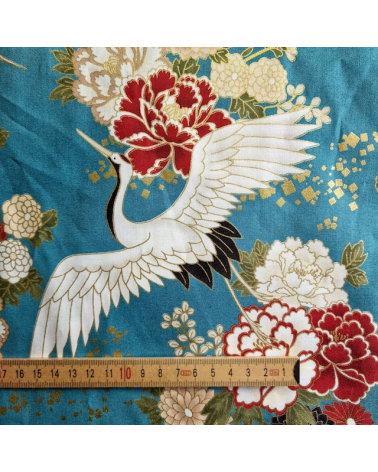 Japanese fabric. Flying Cranes and flowers in greenish blue.