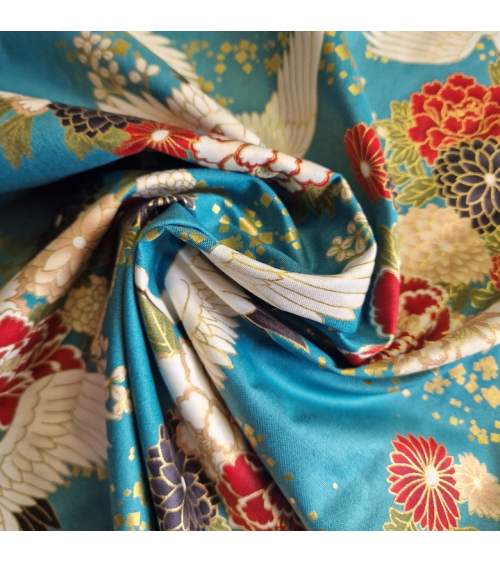 Japanese fabric. Flying Cranes and flowers in greenish blue.