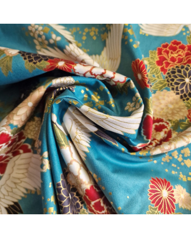 Japanese fabric. Flying Cranes and flowers in greenish blue.