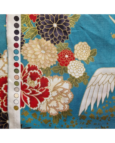 Japanese fabric. Flying Cranes and flowers in greenish blue.