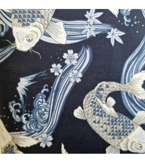 Japanese fabric Koi swimming up the stream in shades of blue.