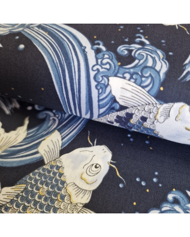 Japanese fabric Koi swimming up the stream in shades of blue.