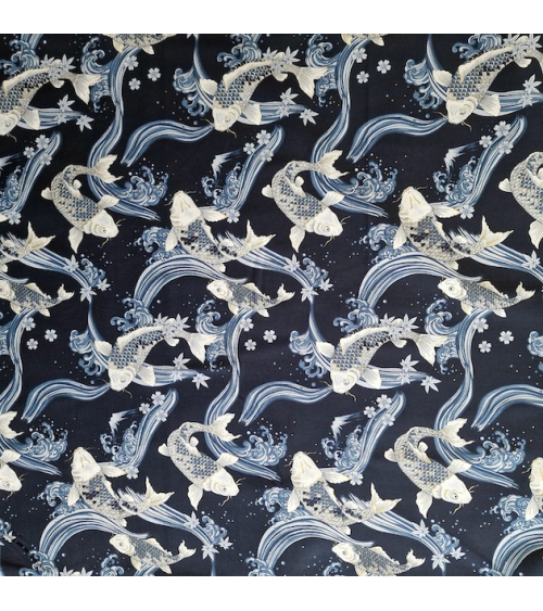 Japanese fabric Koi swimming up the stream in shades of blue.