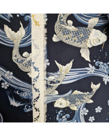 Japanese fabric Koi swimming up the stream in shades of blue.