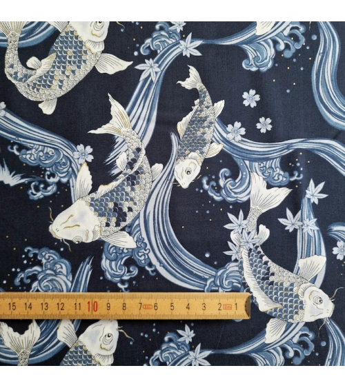 Japanese fabric Koi swimming up the stream in shades of blue.
