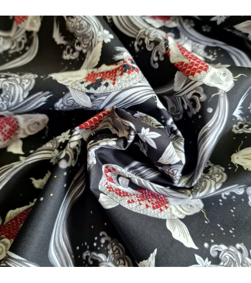 Japanese fabric Red Koi swimming up the stream in black.