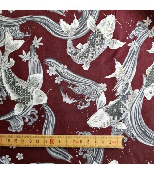 Japanese fabric Koi swimming up the stream in burgundy.