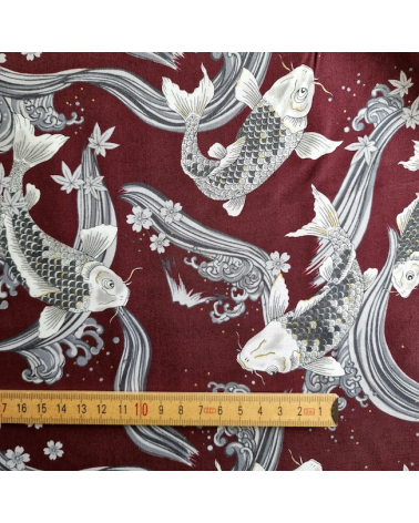 Japanese fabric Koi swimming up the stream in burgundy.