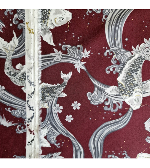 Japanese fabric Koi swimming up the stream in burgundy.