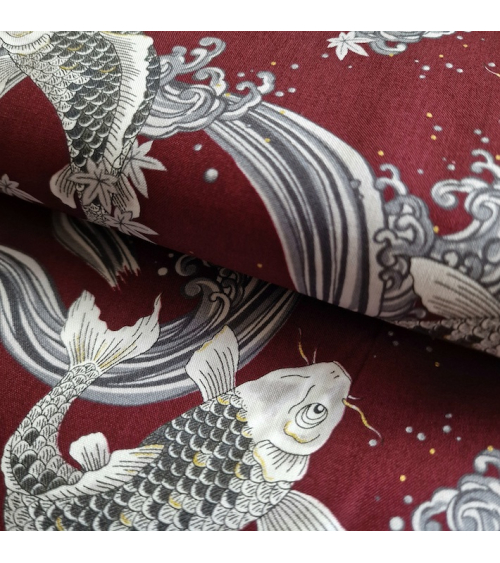Japanese fabric Koi swimming up the stream in burgundy.