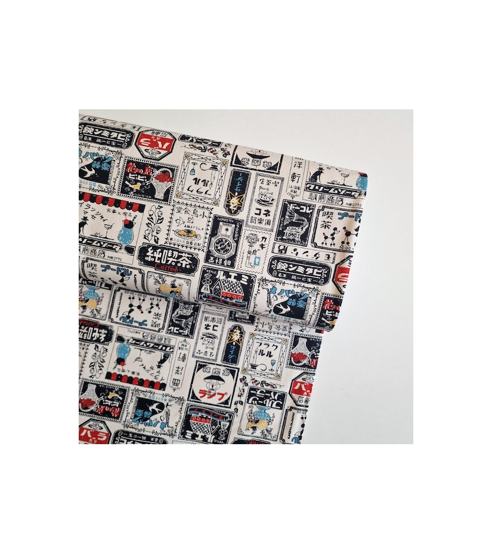 Japanese canvas fabric Retro Labels in natural white. 100% cotton.