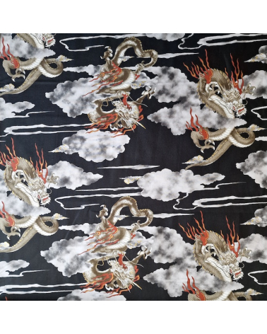 Japanese cotton fabric of dragons and clouds on black.