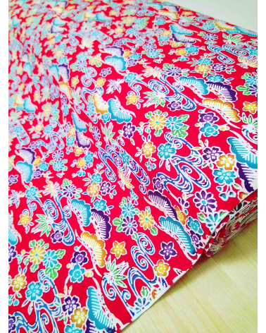 Japanese fabric. Bingata floral print over red.