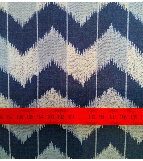 Zigzag pattern over an indigo blue