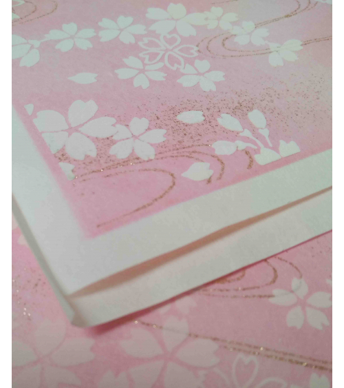 Papel chiyogami sakuras blancas en relieve sobre fondo rosa