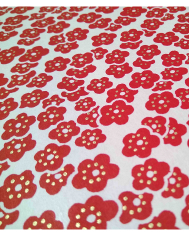 Chiyogami paper. Red plum blossoms over white
