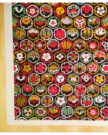 Chiyogami paper. Colorful family crests over black