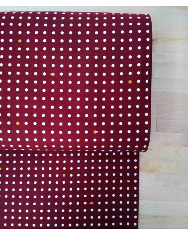 Japanese cotton fabric. Polka dots over maroon.