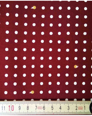 Japanese cotton fabric. Polka dots over maroon.