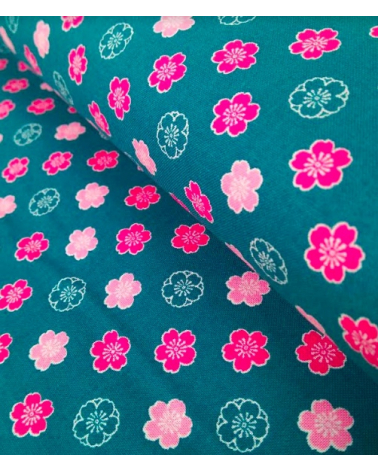 Japanese cotton fabric. Sakura flowers over blue