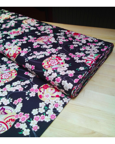 Japanese fabric. Sakura and temari over black.