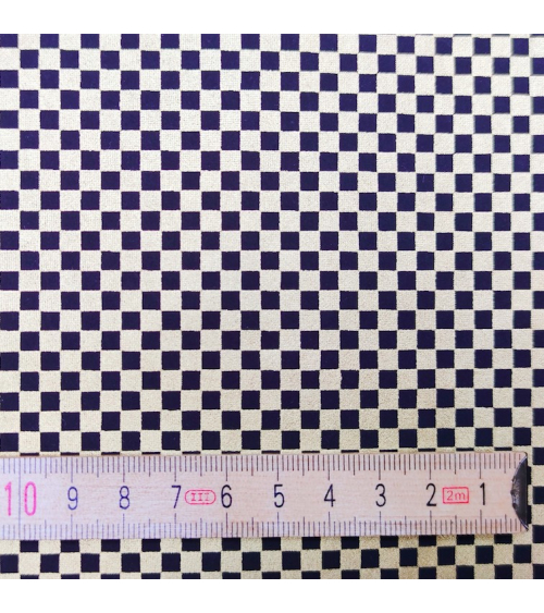 Chiyogami paper with checkerboard pattern in gold and black