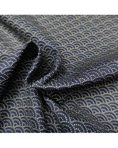 Japanese cotton fabric 'Seigaiha' traced with dots over blue