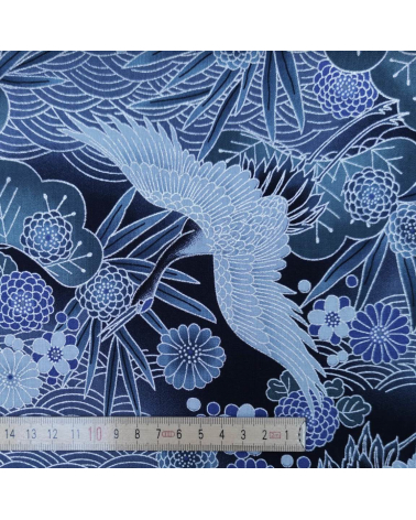 Japanese cotton fabric of cranes with silver details.