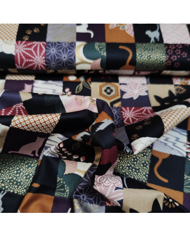 Japanese fabric. Cats Patchwork in subdued colours.