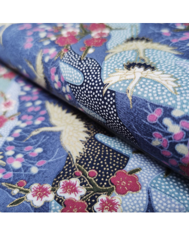 Japanese cotton fabric of cranes and ume with golden details.
