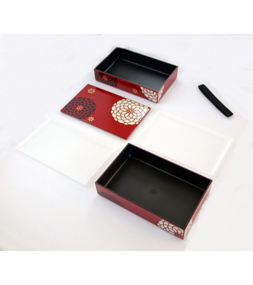Bento box (lunch box) flores blancas y negras sobre fondo rojo