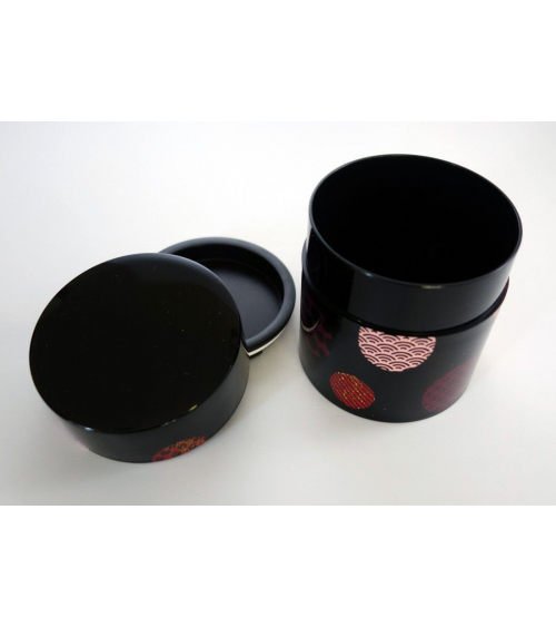 Bote para té con círculos con motivos japoneses y fondo negro