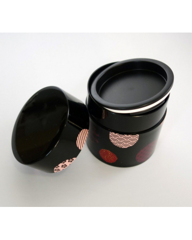 Bote para té con círculos con motivos japoneses y fondo negro
