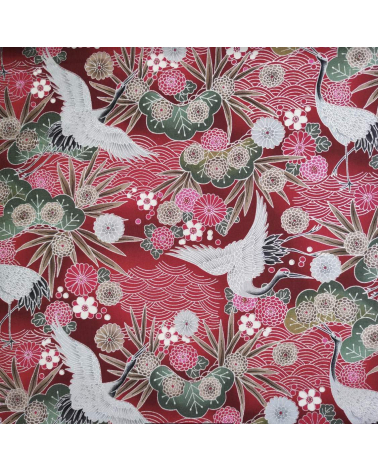 Japanese cotton fabric of cranes in red with silver details.