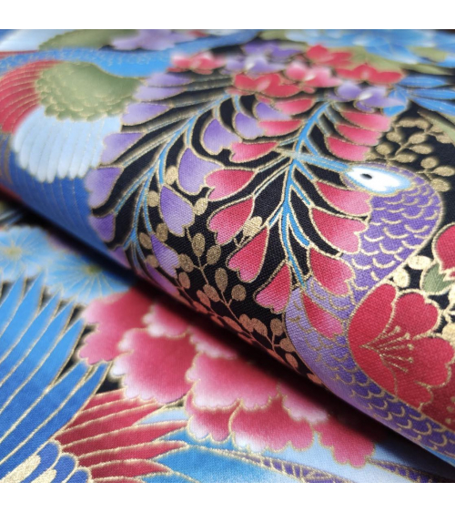 Japanese peacock fabric in blue with gold details.