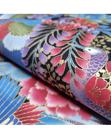 Japanese peacock fabric in blue with gold details.