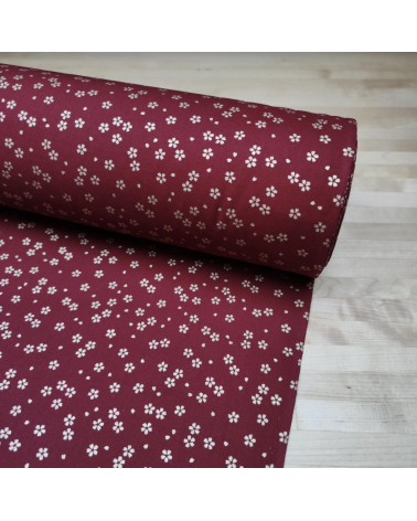 Japanese cotton fabric with golden sakuras over cherry red