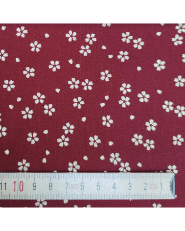 Japanese cotton fabric with golden sakuras over cherry red
