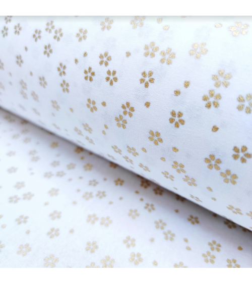 Japanese cotton fabric with golden sakuras over white