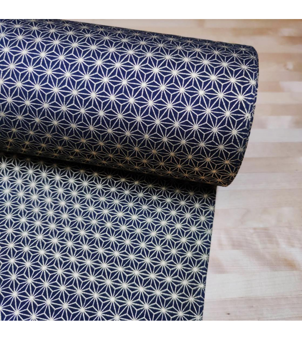 Japanese cotton fabric with golden asanohas over black