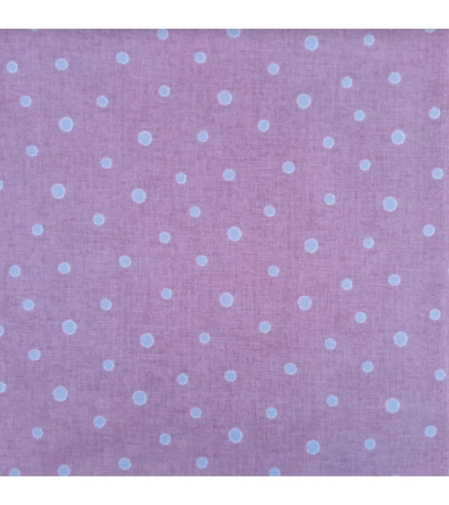 Japanese cotton-linen fabric with irregular polka dots over mauve background