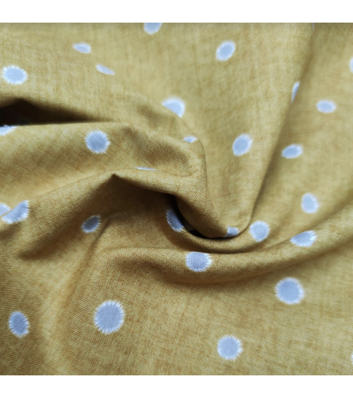 Tela japonesa algodón-lino lunares irregulares en mostaza.
