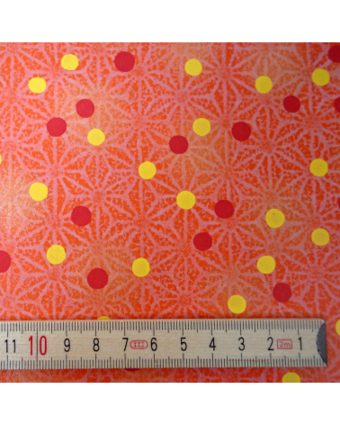 Papel japonés chiyogami ashanoas y puntos sobre fondo naranja