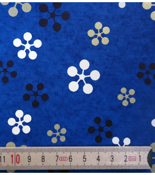 Papel japonés chiyogami gráfico flores de ciruelo sobre azul oscuro